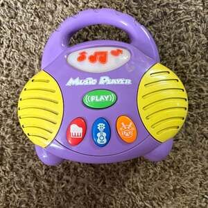 Purple Kids Musical Player Toy with Light-Up Notes and Instrument Buttons